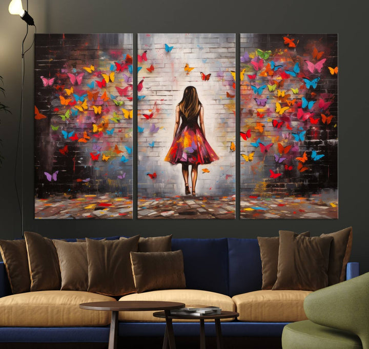 A vibrant artwork titled "Graffiti Wall Art Canvas Print Girl Butterfly Graffiti Abstract Canvas Print" is displayed above the couch. This gallery-wrapped masterpiece, printed on museum-quality canvas, features a UV-protective coating to preserve its vivid beauty.