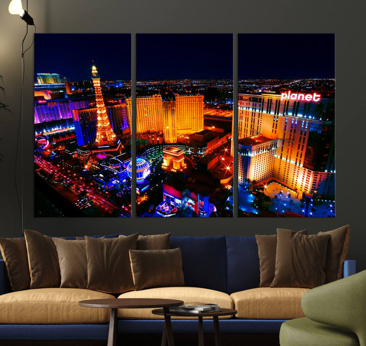 Las Vegas Wall Art Canvas Print showcases a dynamic and luminous cityscape at night with tall buildings and bustling streets. Expertly printed on museum-quality canvas, this gallery-wrapped artwork is enhanced with a UV-protective coating to ensure lasting brilliance.