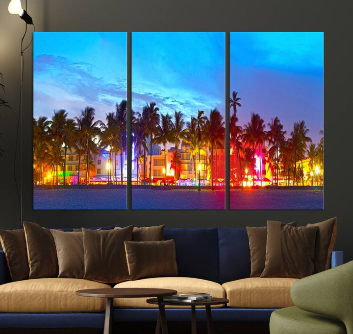 The living room features a three-panel Miami City Wall Art Canvas Print, showcasing a colorful, illuminated beach scene with palm trees on museum-quality canvas.