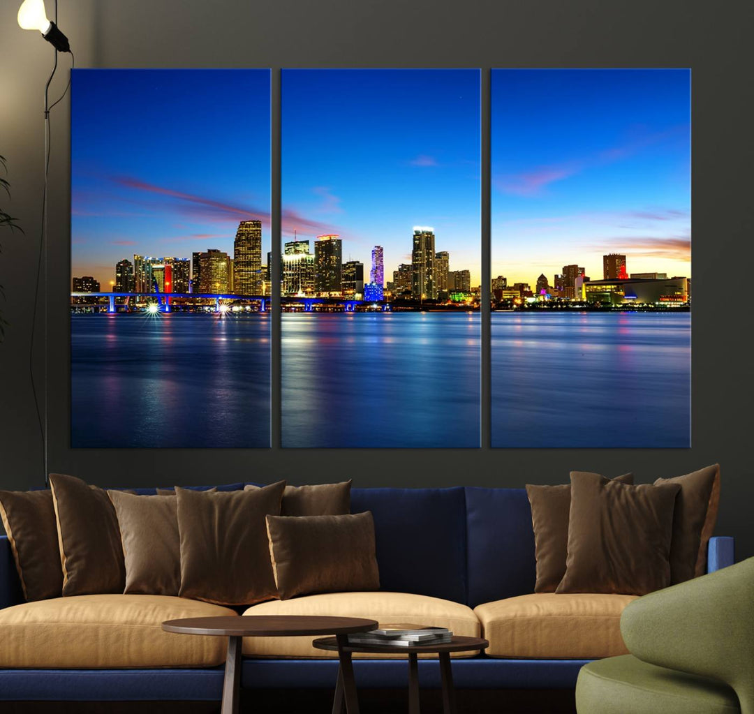 The living room features a Miami City Wall Art Canvas Print—a gallery-wrapped triptych displaying a city skyline at dusk, adding museum-quality elegance to the space.