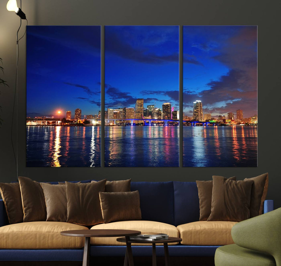 A large Miami City View Wall Art Canvas Print featuring the Miami City Skyline Panorama at night is displayed above the dresser.