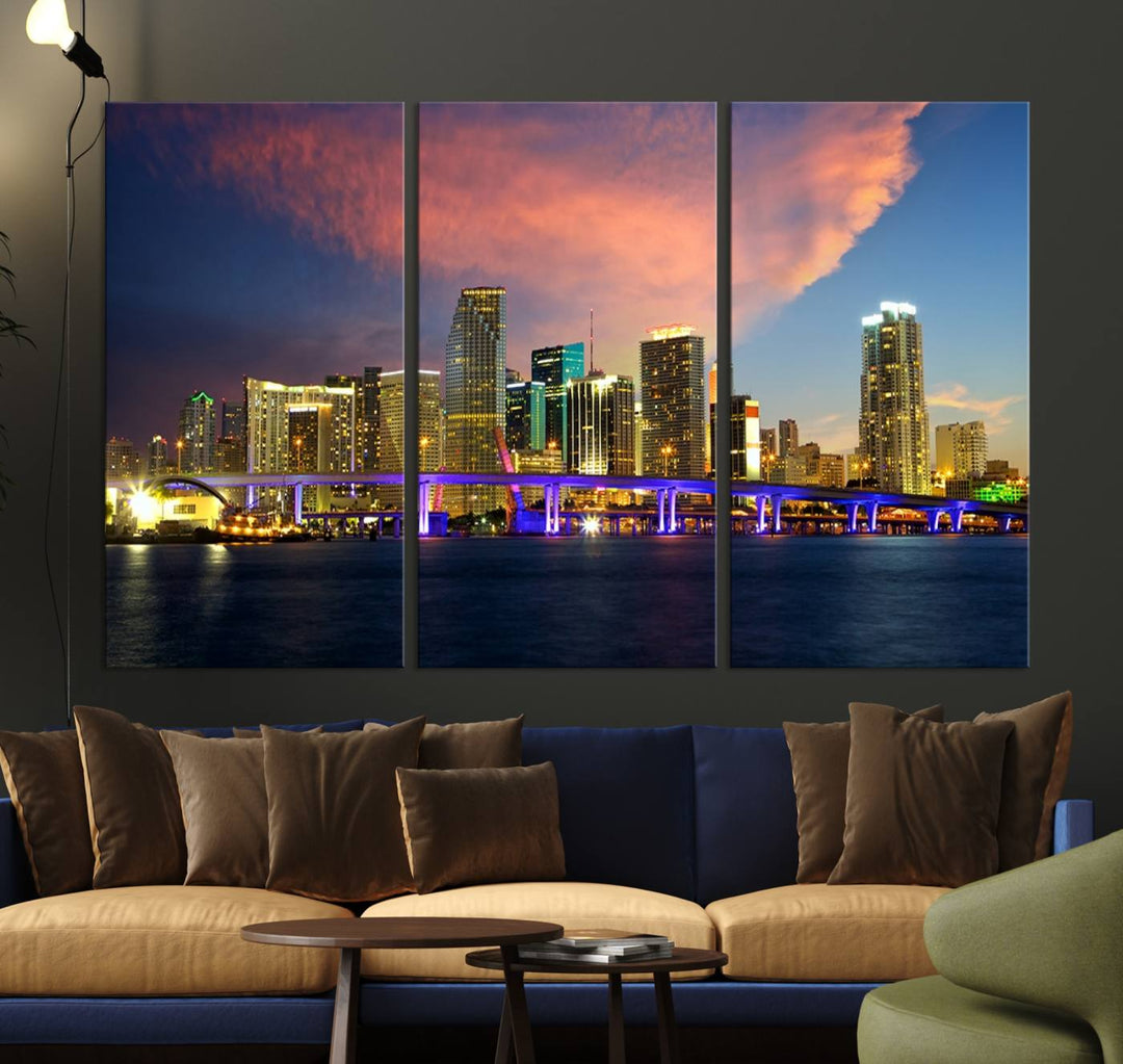 The modern living room is enhanced by the "Miami City Wall Art Canvas Print," a stunning triptych portraying a city skyline at sunset. These canvases are gallery wrapped and made from museum-quality materials, featuring a UV-protective coating to ensure lasting vibrancy.