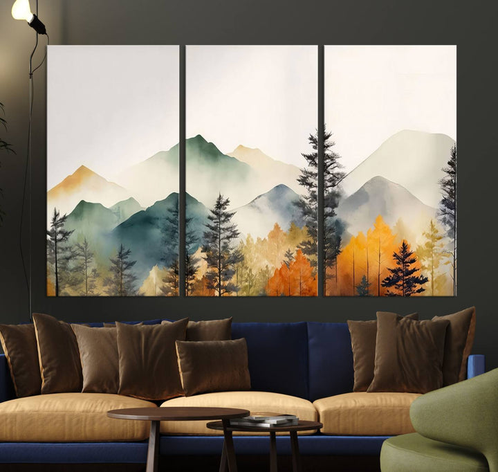 The Abstract Watercolor Mountains and Trees Autumn Wall Art, crafted on museum-quality canvas, decorates the space with its stunning triptych design. This wall art features autumn-colored mountains and trees, expertly gallery wrapped for a seamless and elegant addition to your living room.