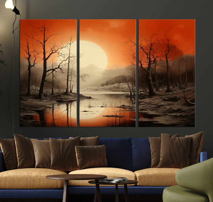 The "Abstract Watercolor Trees and Sunset on Lake Wall Art" is a triptych masterpiece, showcasing an orange-hued landscape of barren trees and a large sun. Displayed on museum-quality canvases with UV-protective coating, it creates a striking visual element in any space.