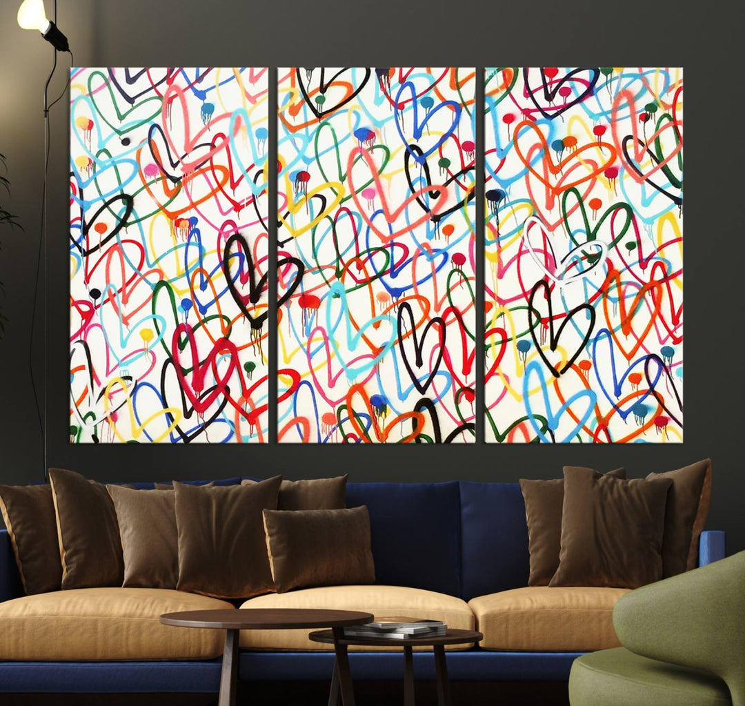 The "Colorful Love Canvas print," featuring vibrant abstract street art with overlapping loops, is handmade in the USA.