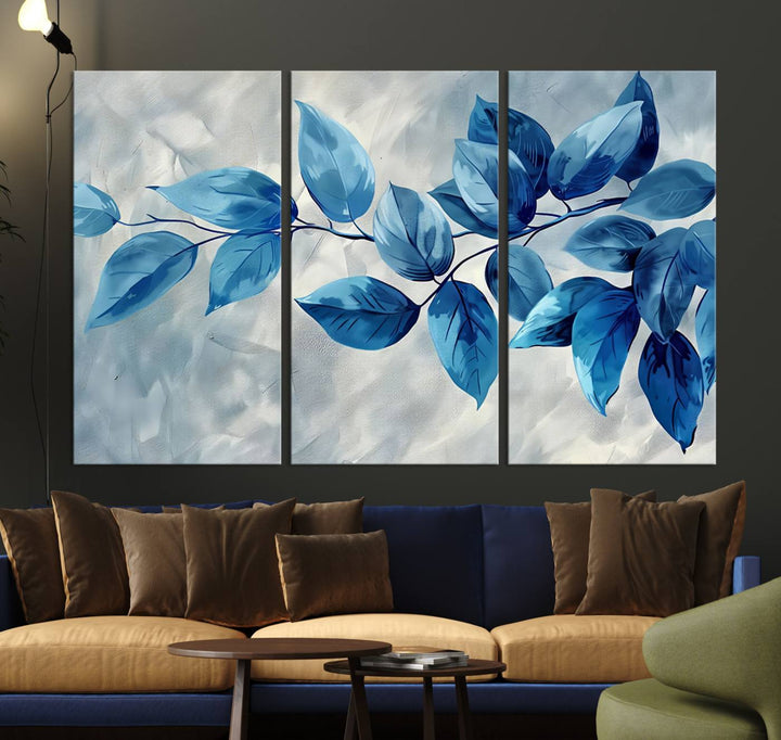 A Blue Leaf Abstract Wall Art Canvas Print, featuring a textured background and gallery-quality finish, is displayed.