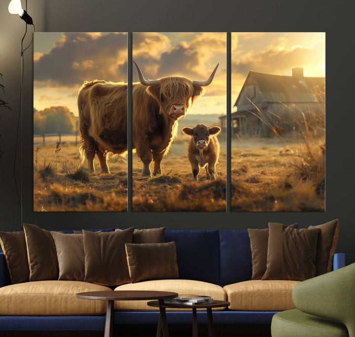 The "Highland Baby Cow Canvas Wall Art Animal Print" triptych art piece showcases a cow and calf in a sunlit field with a barn in the background.