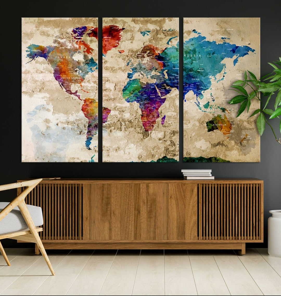 A stunning Abstract Large World Map Canvas Print, featuring a watercolor multi-color design, is elegantly displayed.