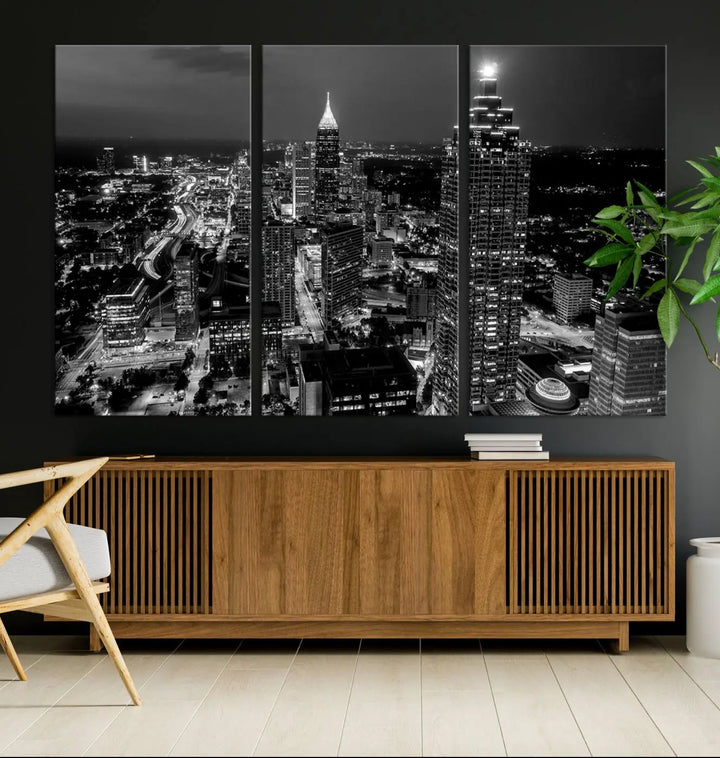 The Atlanta City Lights Skyline Black and White Wall Art Cityscape Canvas Print is elegantly displayed on the wall. These museum-quality canvases arrive ready to hang, making your art display both effortless and sophisticated.