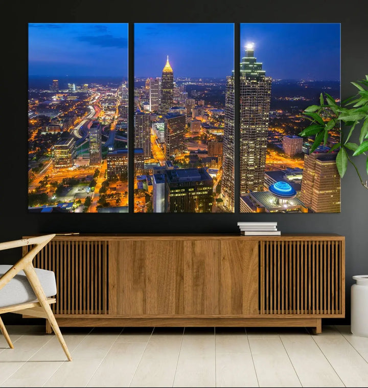 An elegant Atlanta City Blue Skyline Cityscape View Wall Art Canvas Print graces the wall, offering a sophisticated addition to your living space. Enjoy free shipping on this stylish piece.