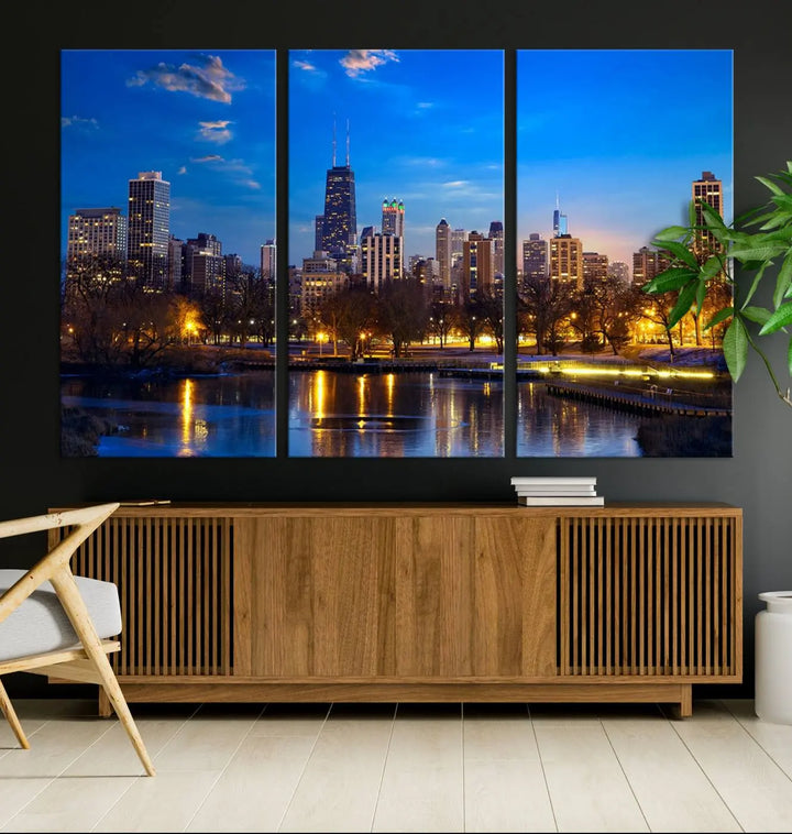 A triptych photo titled "Chicago City Lights Night Blue Skyline Cityscape View Wall Art Canvas Print" is elegantly displayed on gallery-wrapped, museum-quality canvases.