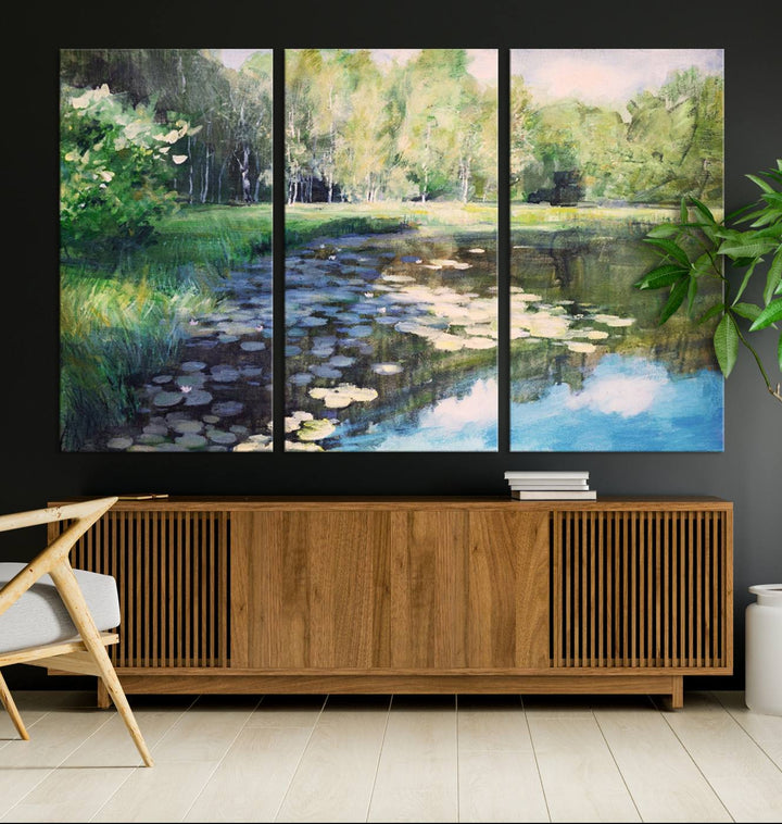 The "Forest Pond River Lake Wall Art Canvas Print" showcases a serene lakeside landscape with trees and water lilies. Crafted on museum-quality canvases and enhanced with UV-protective coating, this piece serves as an elegant addition to any space.