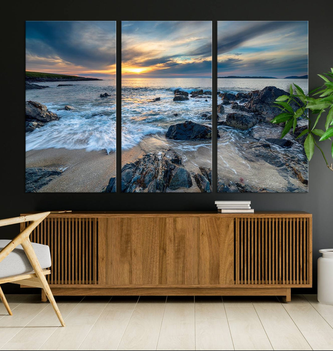 The "Beautiful Stormy Sunset at Bagh Steinigidh Beach Stones" triptych ocean-themed wall art is displayed on museum-quality canvas and features a UV-protective coating.