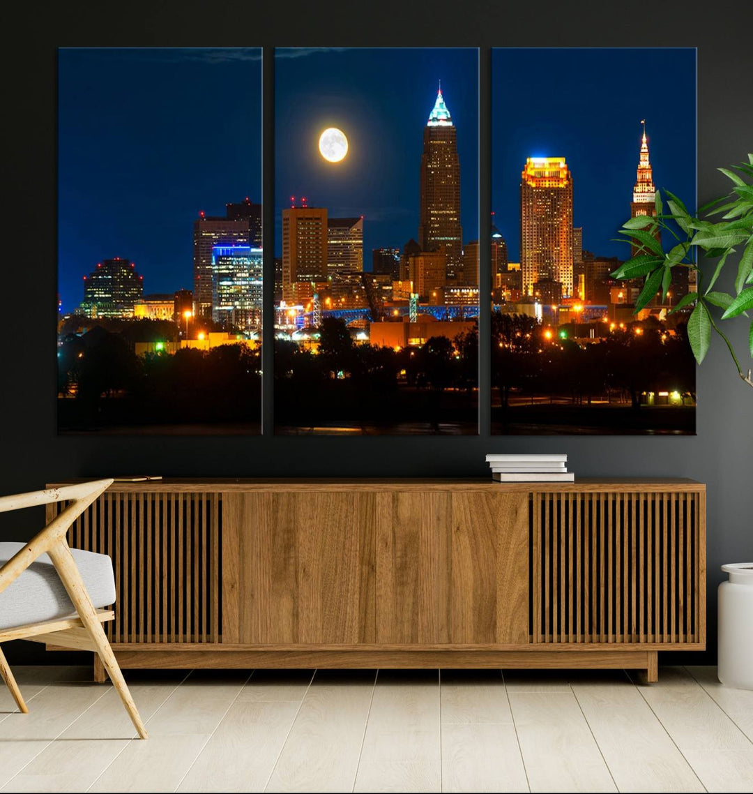 The "Cleveland Night Skyline Wall Art City Cityscape Canvas Print" adds elegance to the room with its depiction of a city skyline and full moon on museum-quality canvas. The artwork is enhanced by a UV-protective coating to ensure lasting brilliance.