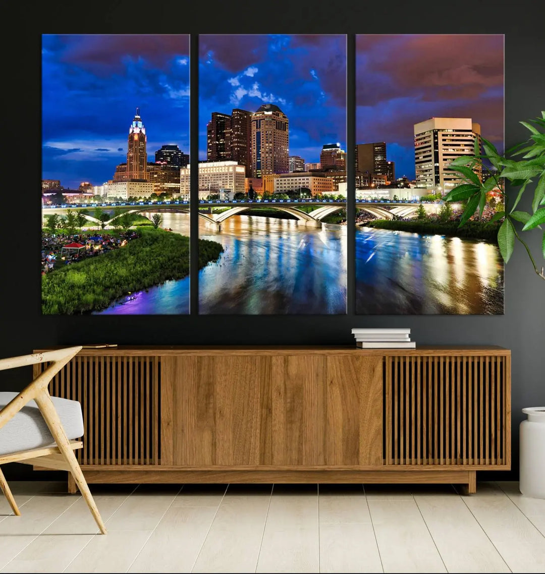 Columbus City Lights Night Bright Blue Cloudy Skyline Cityscape View Wall Art Canvas Print, gallery wrapped on museum-quality canvas, reflecting on a river.