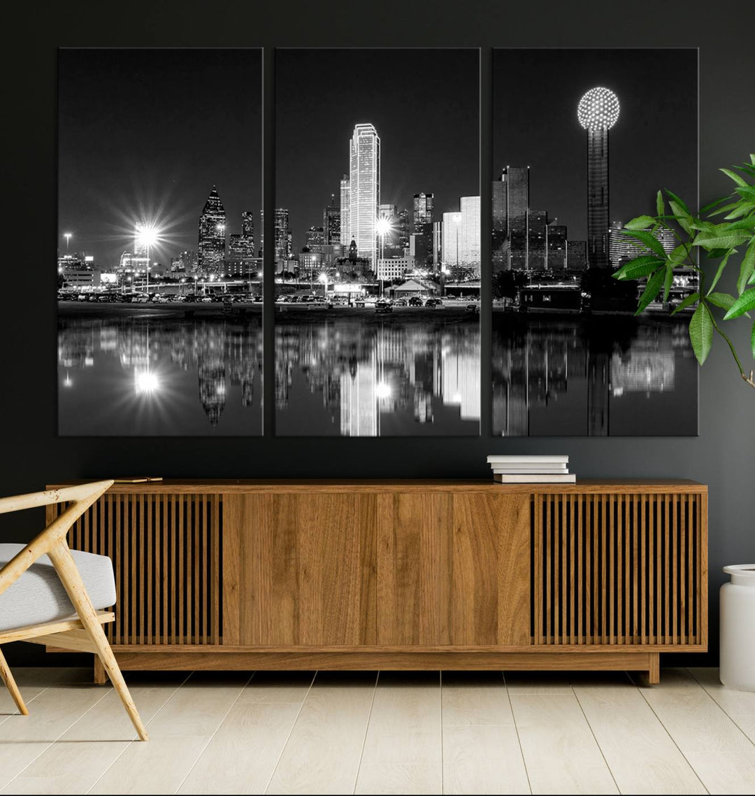 The living room showcases the Dallas City Lights Skyline Black and White Wall Art Cityscape Canvas Print. This museum-quality artwork is ready to hang and features a UV-protective coating to maintain its vibrant colors.