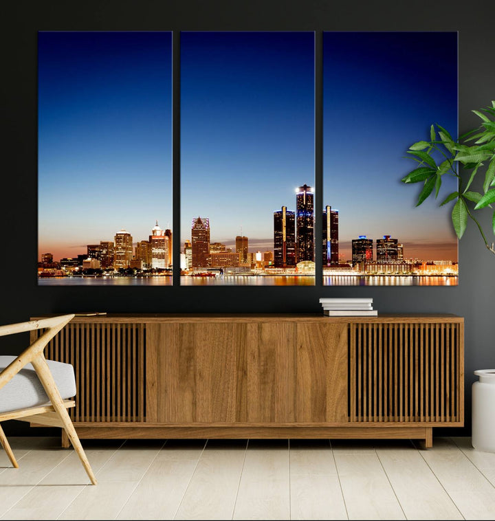 The Detroit City Lights Sunrise Skyline Cityscape View Wall Art Canvas Print adorns the modern living room. Crafted on museum-quality canvas with a UV-protective coating, this piece is ready to hang and elegantly elevates your décor.