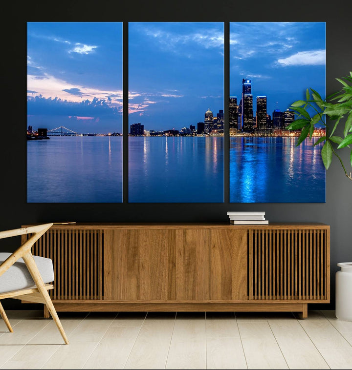 The "Detroit City Lights Night Blue Cloudy Skyline Cityscape View" wall art, displayed on museum-quality canvases, is split into three gallery-wrapped panels.