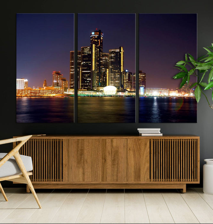 The Detroit City Lights Night Skyline Cityscape View Wall Art Canvas Print, elegantly split into three panels, is made from museum-quality pollycotton and gallery wrapped for a sophisticated touch. It is available with free shipping to effortlessly elevate your space.