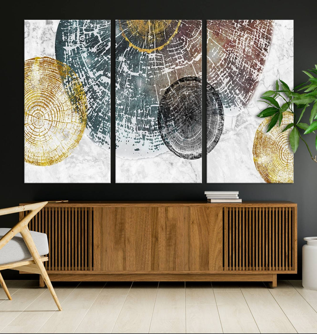 Contemporary living room showcasing the "Wood Lines" 3 Panel Abstract Wall Art Canvas Print displaying museum-quality tree ring art on the wall.