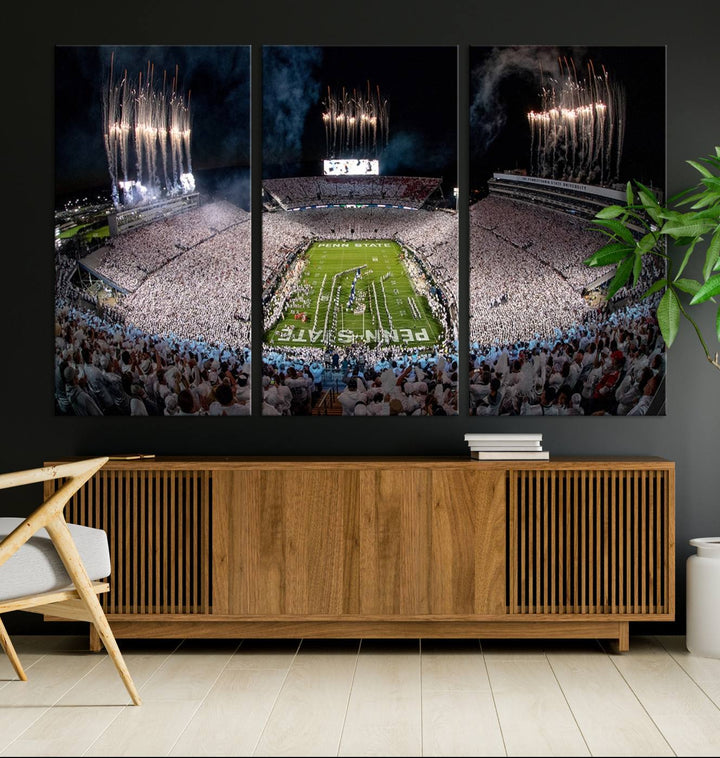 The Penn Stadium Football Wall Art Canvas Print showcases the lively ambiance of a bustling Pennsylvania University football stadium illuminated by fireworks.