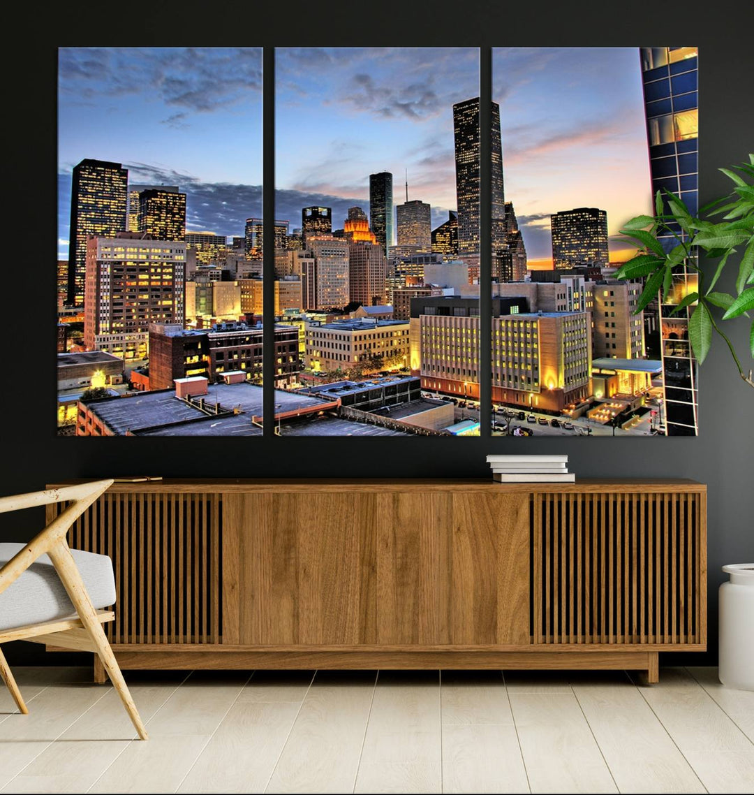 The modern living room features the Houston Wall Art Canvas Print on the wall. This professional craftsman framed masterpiece depicts a cityscape and is created with museum-quality polycotton canvas, ensuring a polished look that enhances its elegant charm.