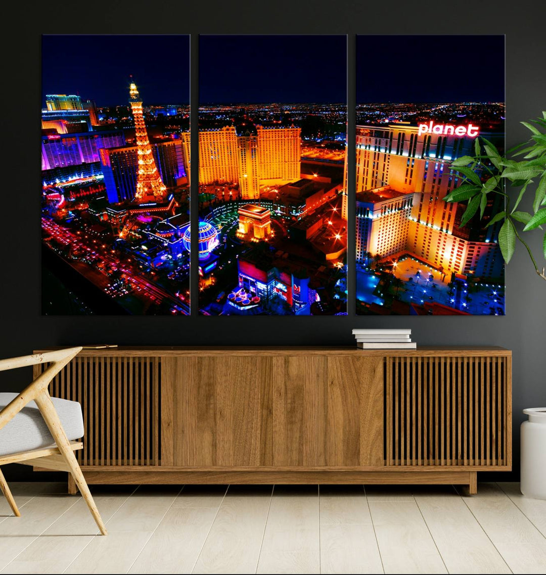 Las Vegas Wall Art Canvas Print showcases a dynamic and luminous cityscape at night with tall buildings and bustling streets. Expertly printed on museum-quality canvas, this gallery-wrapped artwork is enhanced with a UV-protective coating to ensure lasting brilliance.