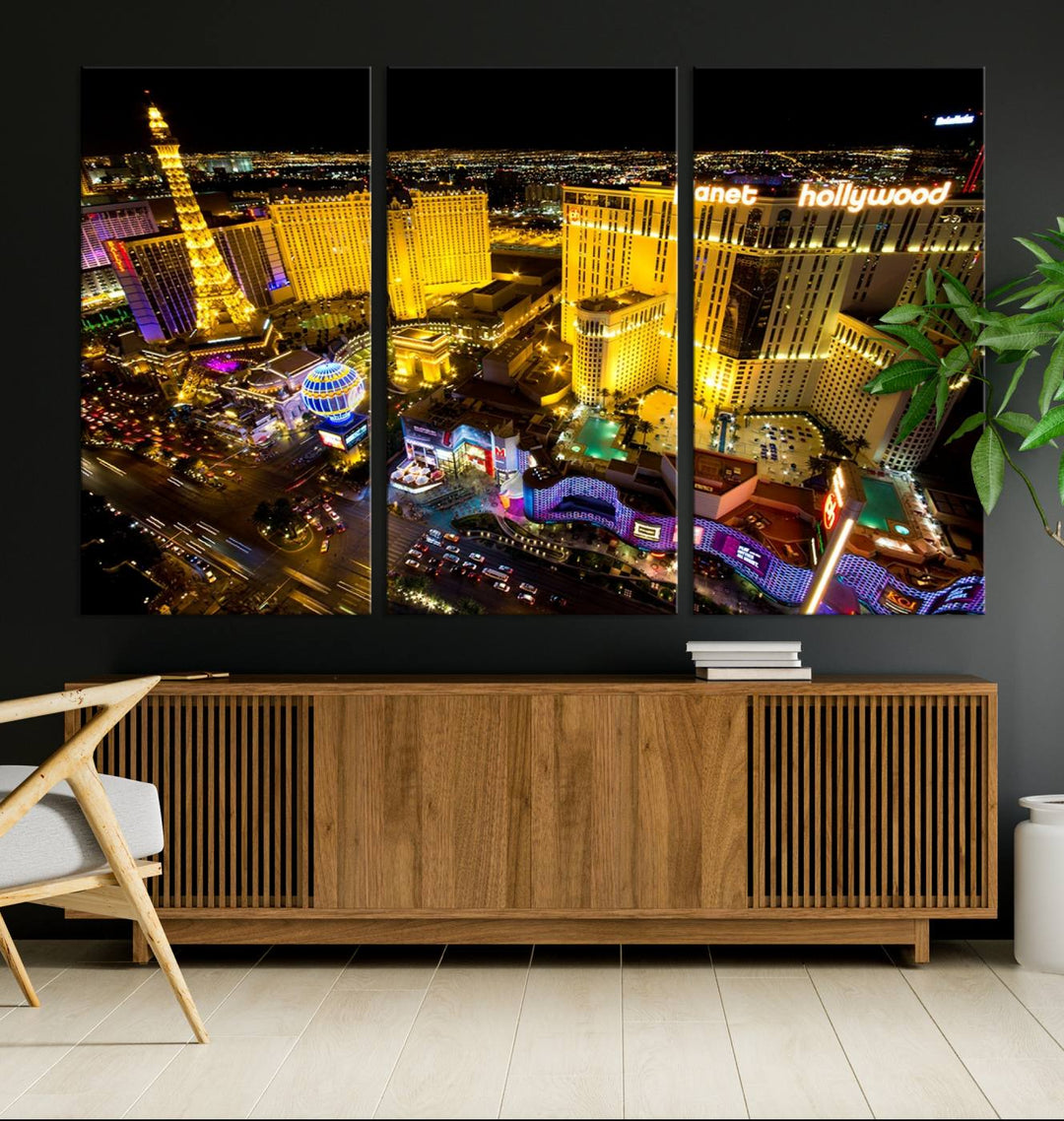 The modern living room features a Las Vegas Wall Art Canvas Print, a museum-quality triptych showcasing a vibrant cityscape with neon lights.