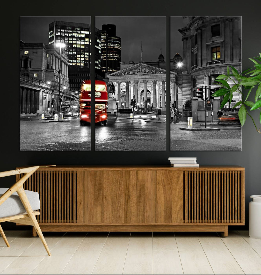 The London Night Red Bus Wall Art Canvas Print features a black and white cityscape with a moving red double-decker bus, crafted on museum-quality canvas with a UV-protective coating. This ready-to-hang artwork is designed to stand out and enhance any space.