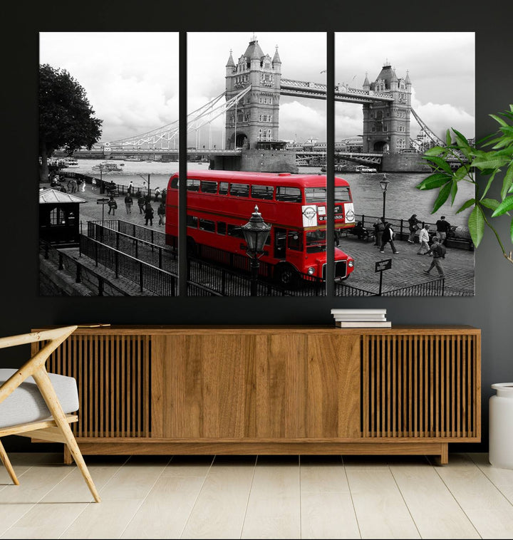 The London Red Bus and Bridge Wall Art Canvas Print showcases a red London bus in front of Tower Bridge, beautifully presented as a gallery-wrapped canvas. This striking image is divided into three panels, delivering a museum-quality display that's ready to hang.