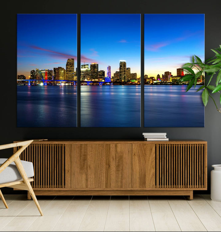 The living room features a Miami City Wall Art Canvas Print—a gallery-wrapped triptych displaying a city skyline at dusk, adding museum-quality elegance to the space.