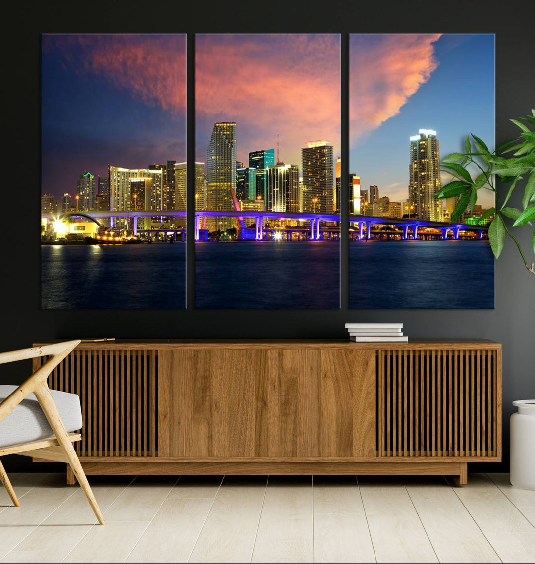 The modern living room is enhanced by the "Miami City Wall Art Canvas Print," a stunning triptych portraying a city skyline at sunset. These canvases are gallery wrapped and made from museum-quality materials, featuring a UV-protective coating to ensure lasting vibrancy.