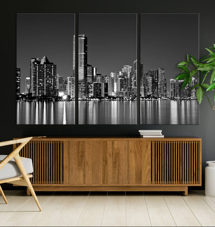 The Miami City Wall Art Canvas Print, a stunning triptych of the Miami skyline, elegantly hangs in this modern living room.