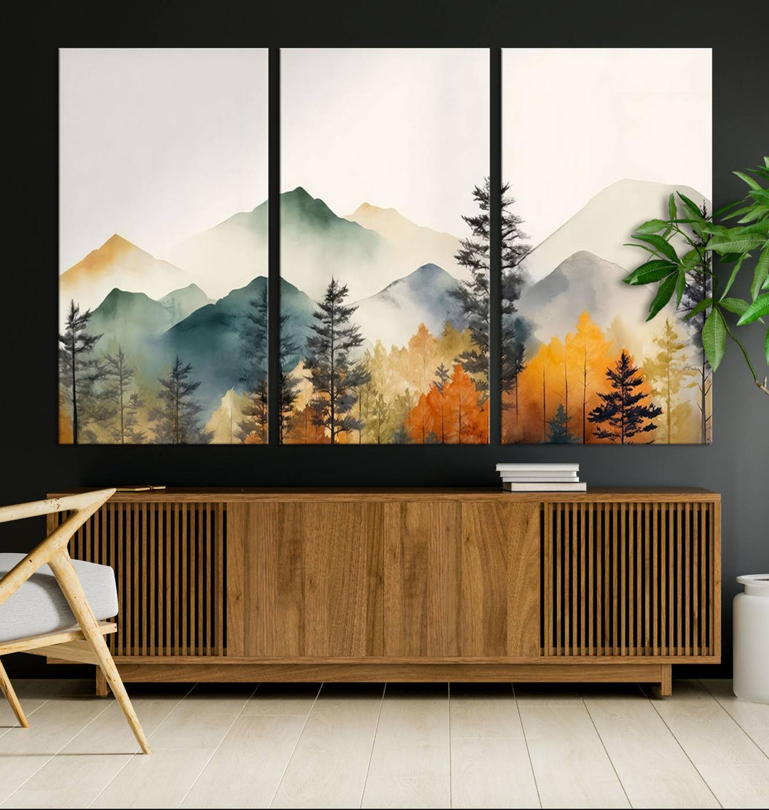 The Abstract Watercolor Mountains and Trees Autumn Wall Art, crafted on museum-quality canvas, decorates the space with its stunning triptych design. This wall art features autumn-colored mountains and trees, expertly gallery wrapped for a seamless and elegant addition to your living room.