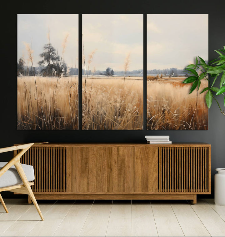 A Wildflower Field Landscape Oil Painting, showcasing a vintage art print of a serene field with tall grasses and distant trees, is beautifully presented on museum-quality canvases with gallery-wrapped edges.