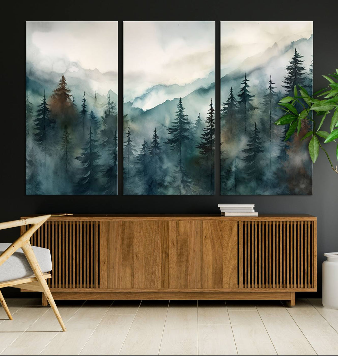 A set of Serenity Forest Wall Art Canvas prints, showcasing foggy mountain landscapes, is displayed in the living room.