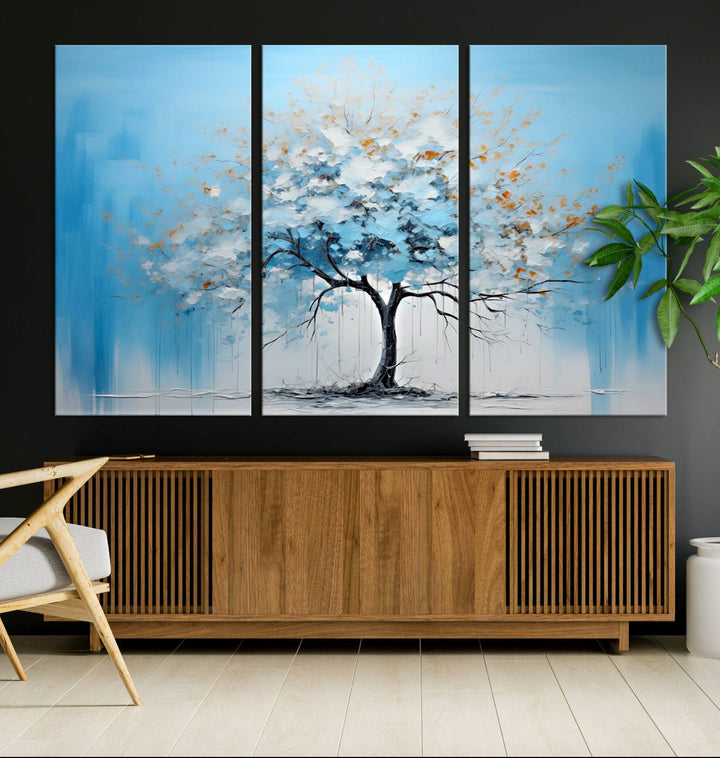 Modern living room featuring the Large Blue Abstract Tree Wall Art Canvas Printing. Enjoy the elegance with free shipping.