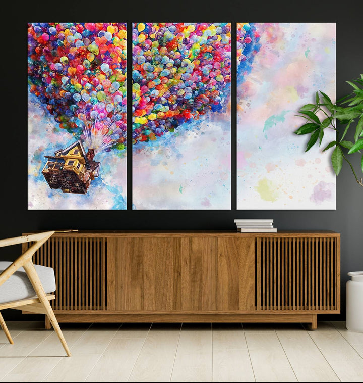 The "Watercolor Cartoon Movie Balloons Canvas Print" is showcased, depicting a whimsical house being lifted by colorful balloons. This triptych wall art is crafted on museum-quality canvases with a UV-protective coating to maintain its vibrant colors, making it ready to hang in any room.