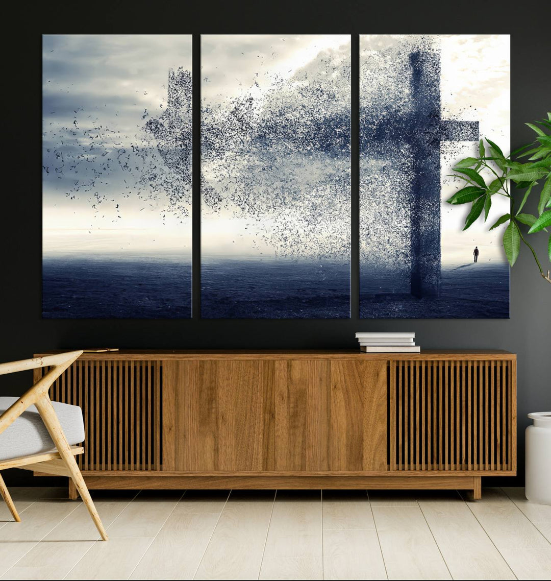 The "Jesus and the Fading Cross – Symbol of Faith" framed canvas print beautifully depicts a cross formed by birds against a moody sky above an ocean. This piece of Christian wall art infuses spirituality into the minimalist space.