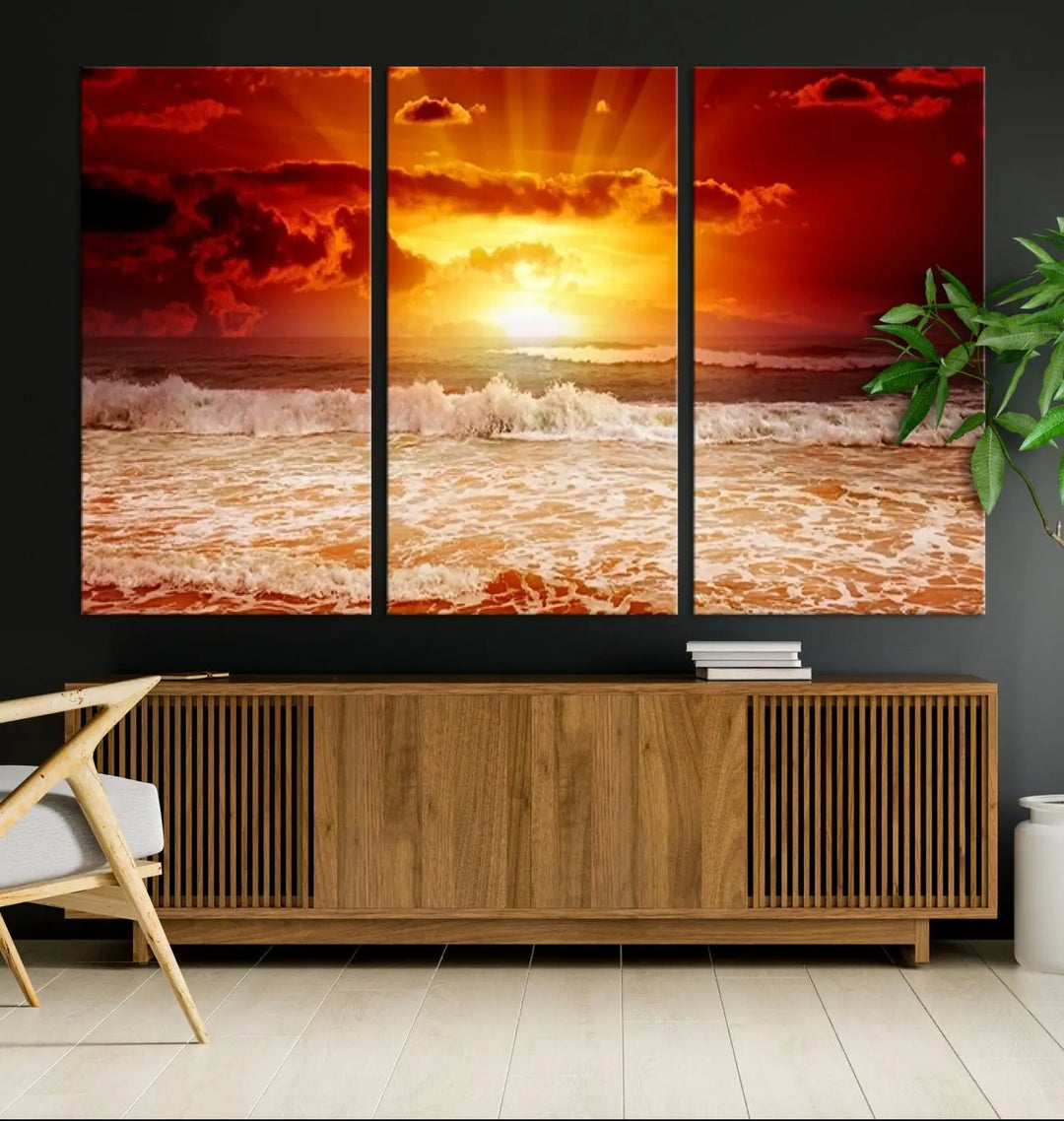 In a modern living room, the vibrant "Wall Art Canvas Perfect Sunset Turns Colour of Sea and Sky to Red," printed on museum-quality canvas, stands out. A floor lamp casts warm light over the ready-to-hang artwork, which includes a UV-protective coating to ensure lasting brilliance.