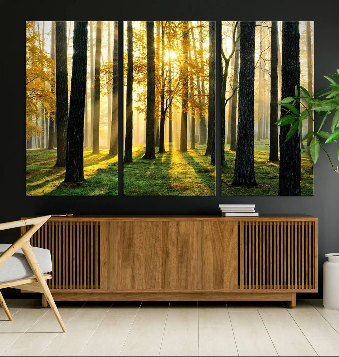 The living room is enhanced by the "Wall Art Landscape Canvas Print Tall Trees in Forest at Sunset" on museum-quality canvas. This triptych, complete with a UV-protective coating, is ready to hang and adds an artistic touch to the space.