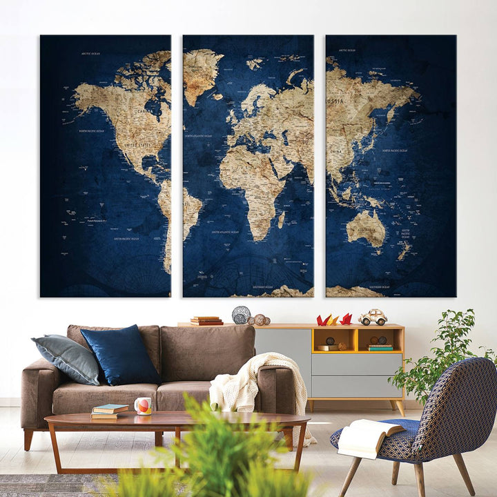 A triptych canvas print titled "Vintage Blue World Map Canvas Print - Classic World Map Design on Deep Blue Wall Art Print" adorns the wall, enhancing the decor with its antique style.