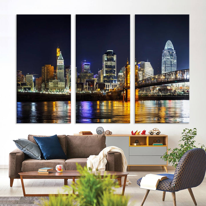 The Cincinnati City Lights Night Skyline Cityscape View Wall Art Canvas Print, crafted on museum-quality canvas with UV-protective coating and ready to hang, adds a touch of sophistication to the wall.