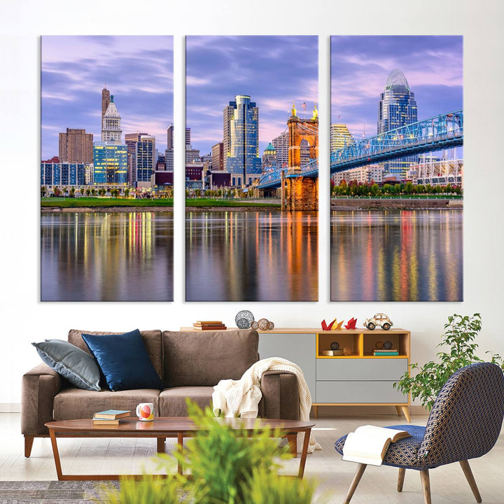 The wall art titled "Cincinnati City Lights Sunset Purple Cloudy Skyline Cityscape View" is beautifully printed on museum-quality canvases with a UV-protective coating and is ready to hang.