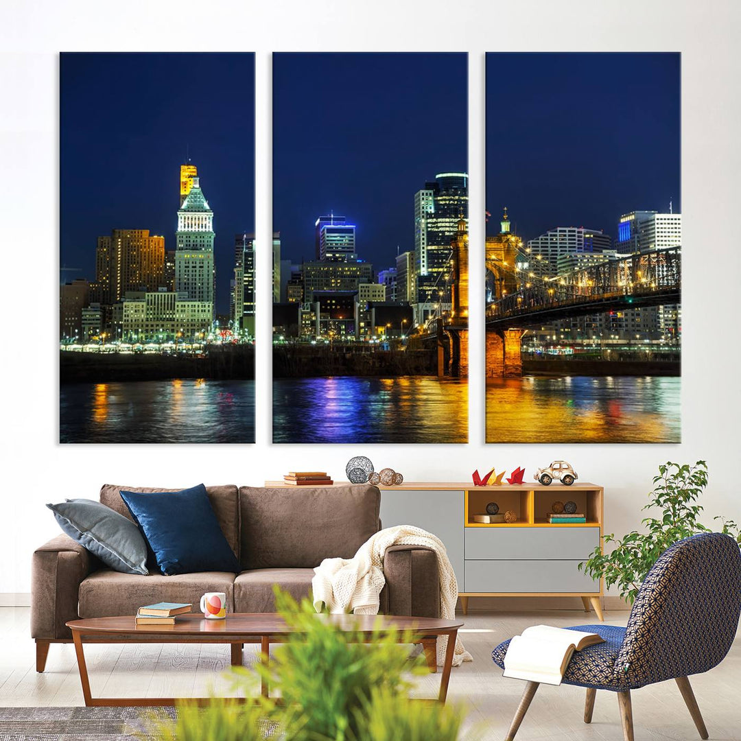 The "Cincinnati City Lights Night Skyline Cityscape" canvas print, displayed above a sofa, exhibits museum-quality craftsmanship with a UV-protective coating.