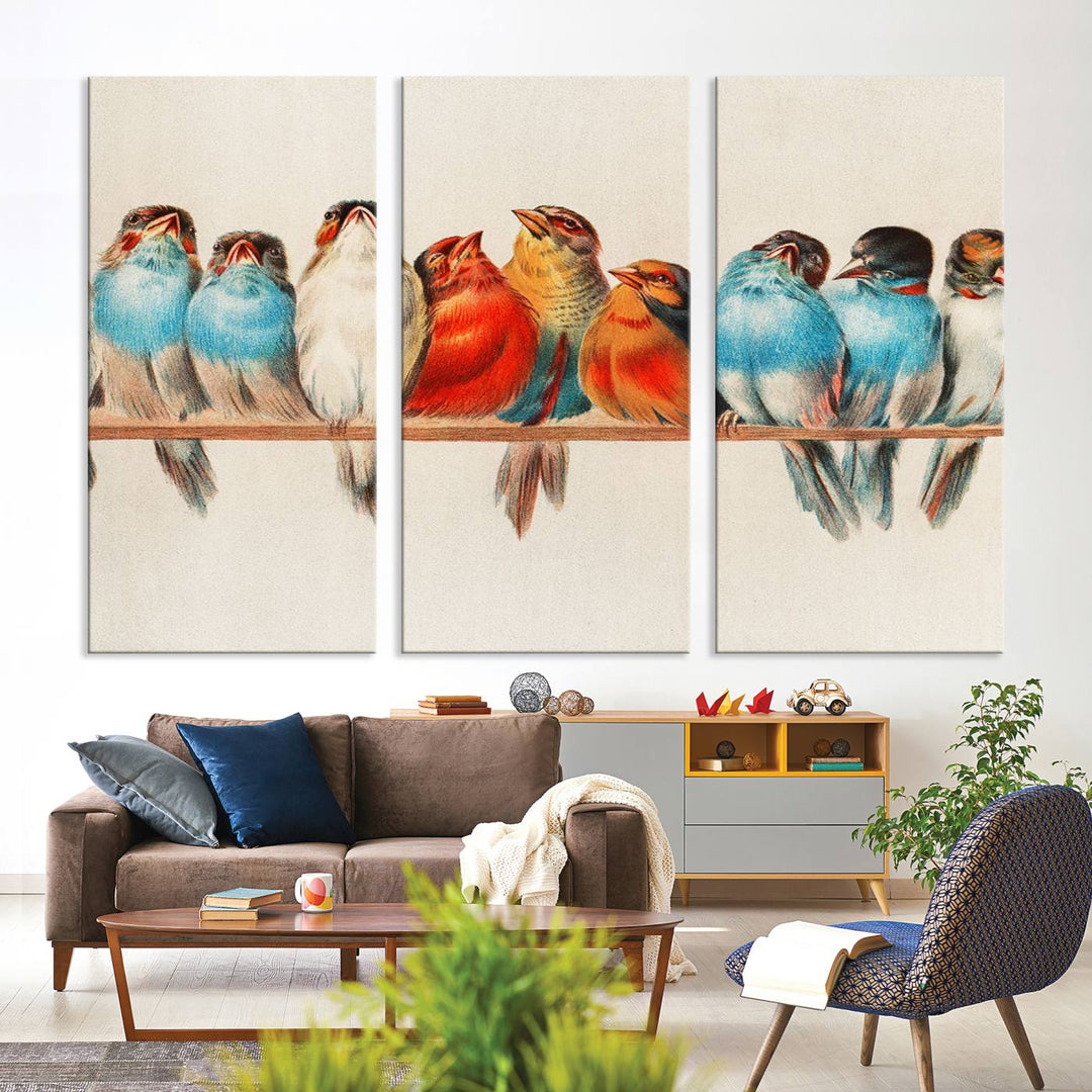 The Abstract Birds Wall Art Canvas Print, featuring a triptych of colorful birds perched on a branch, is printed on museum-quality canvas and equipped with a UV-protective coating and ready-to-hang design. This artwork adds vibrant elegance to your living space.