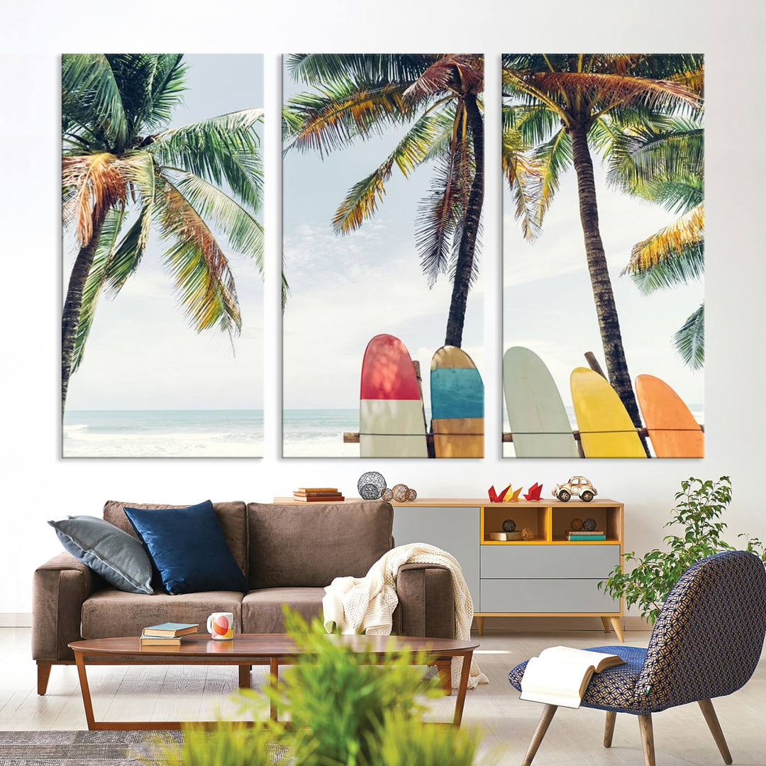 The room showcases The Palm and Surfing Board Wall Art Canvas Print, a triptych of palm trees and surfboards by the beach, elegantly gallery wrapped for a sophisticated finish.