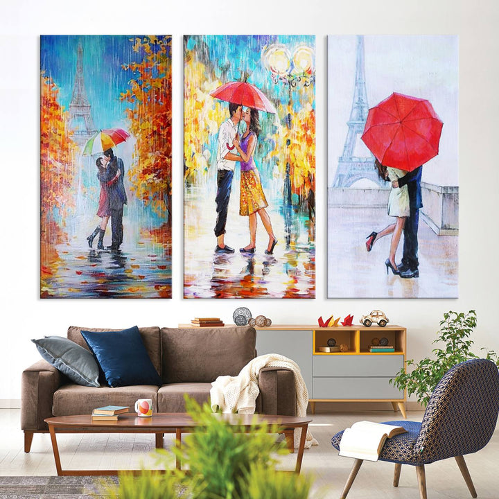 A triptych of the "Love in Paris Wall Art Canvas Print" showcases a couple with an umbrella in romantic settings. This artwork is crafted on museum-quality canvas and features a UV-protective coating for peace of mind. It also comes with the added convenience of free shipping.