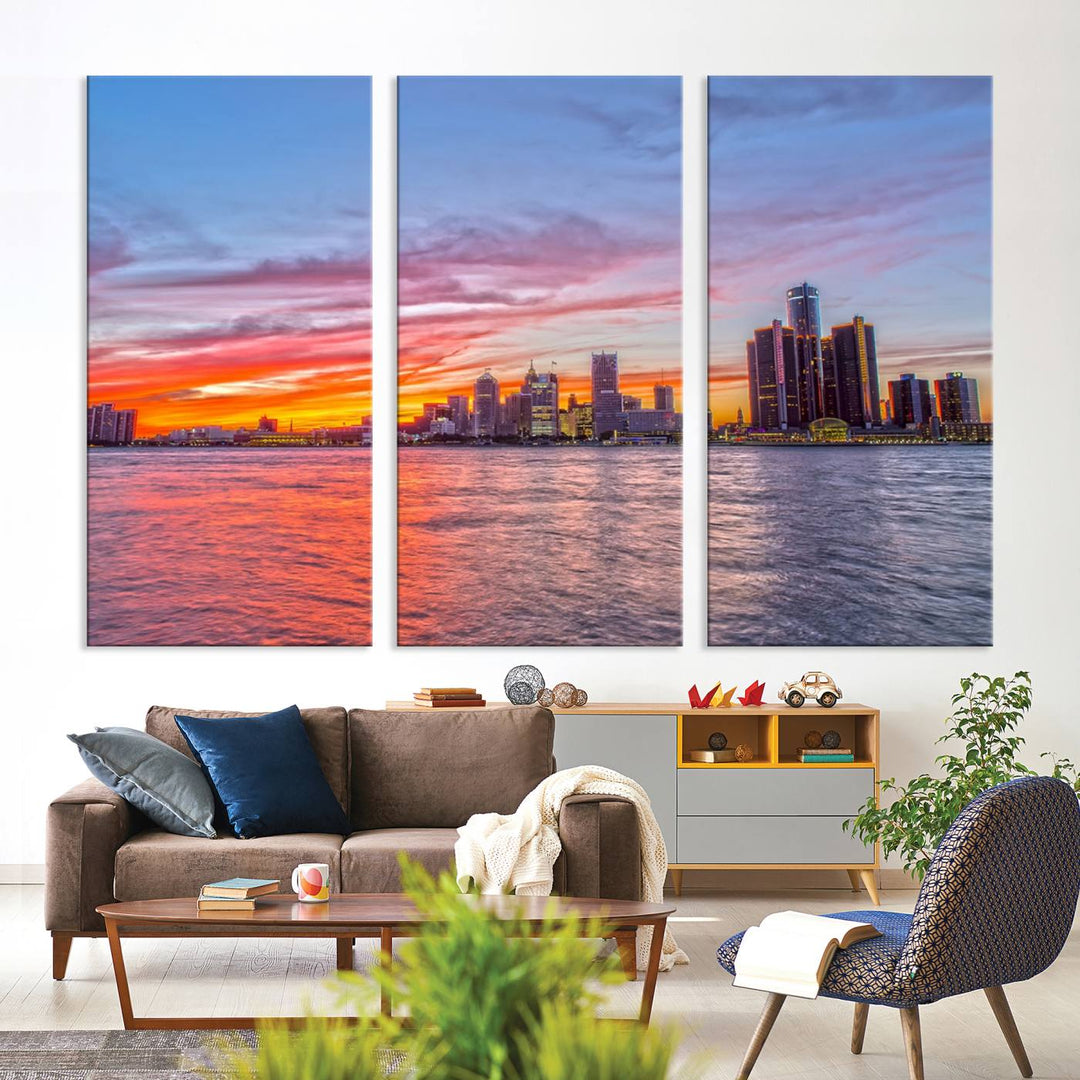 The Detroit City Lights Sunset Colorful Cloudy Skyline Cityscape View Wall Art Canvas Print showcases a vibrant city skyline at sunset over water. The artwork is museum-quality, comes ready to hang, and features a UV-protective coating to preserve its vivid colors.