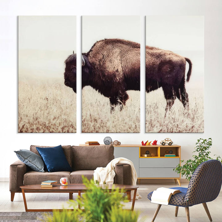 A stylish living room showcases the captivating "Bison in Field" Wall Art Canvas Print as farmhouse decor.